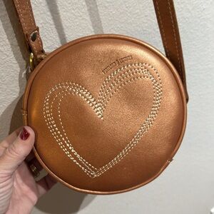 Portland Leather Company original crossbody gold / rose gold colored